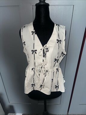Women's Cream Sleeveless Tie-Front Top with Black Bow Print